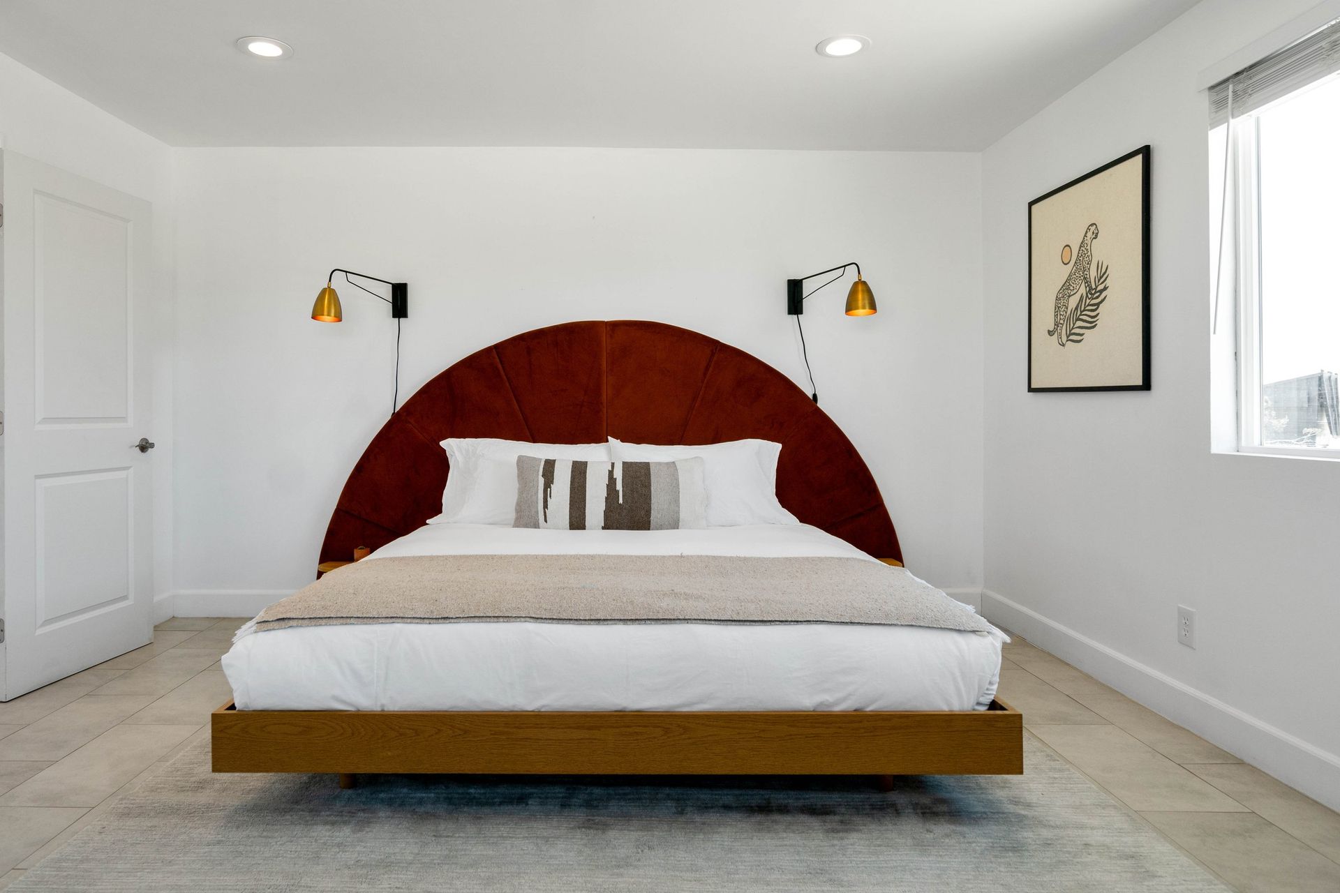 Wonder Valley Ranch bedroom with arched headboard
