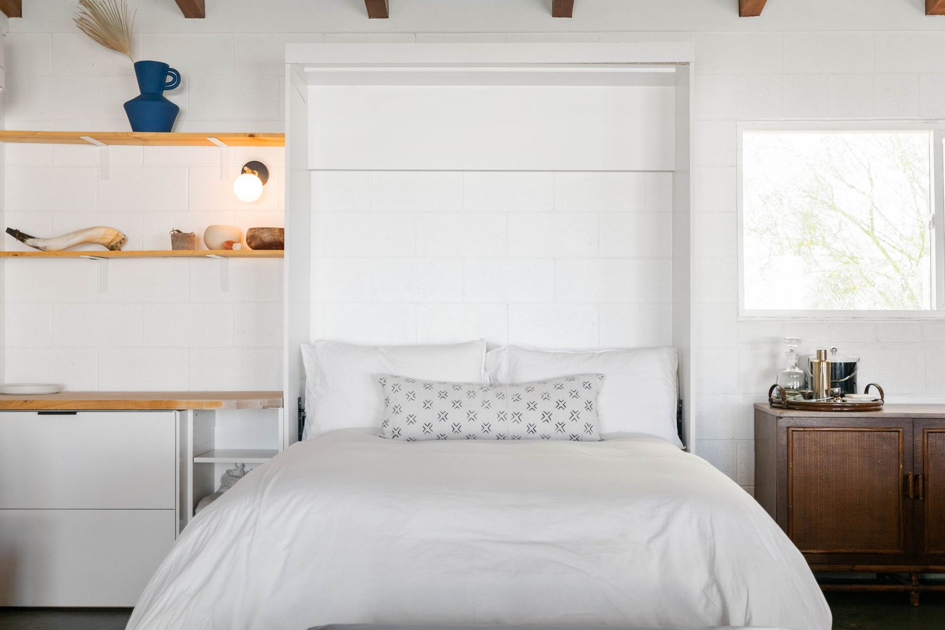 Wonder Valley Ranch bedroom with arched mirror