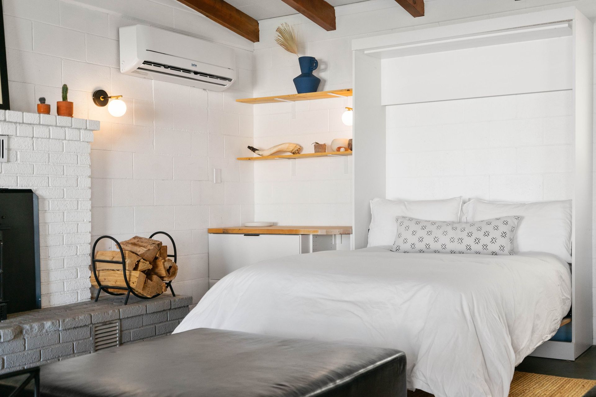 Wonder Valley Ranch bedroom under vaulted ceiling and beams