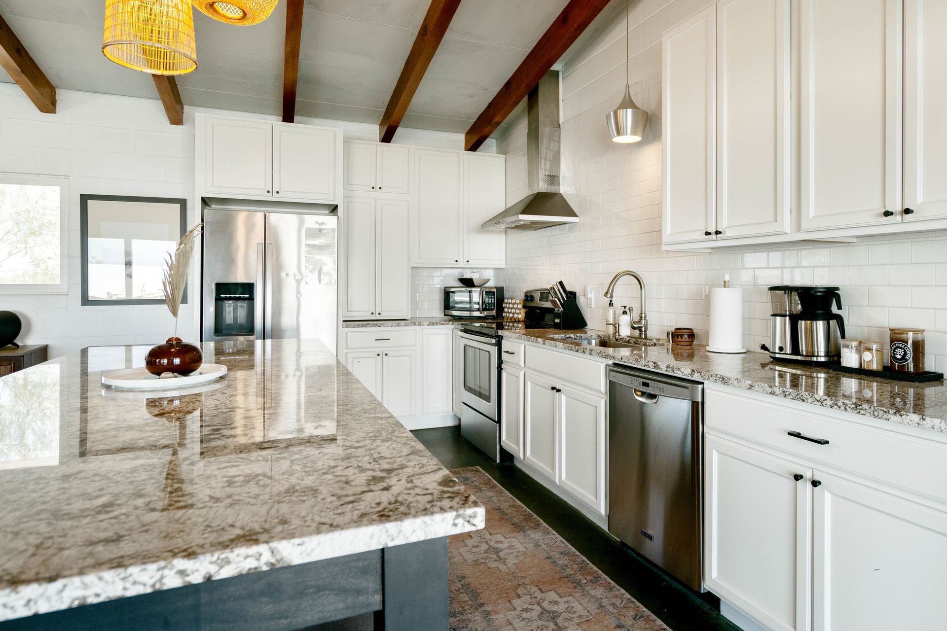 Wonder Valley Ranch kitchen island with bar stools
